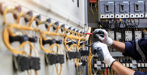 Professional Electrician technician working in Village Green-Green Ridge, PA